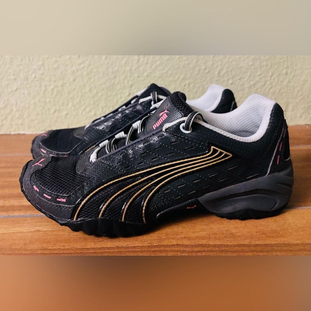 Puma Black Sneakers with Gold and Pink Accents